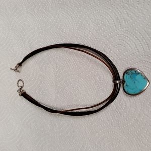 Turquoise necklace on leather with toggle closure.  16 inch. 925 silver